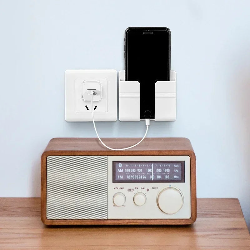 Soporte para teléfono de montaje en pared, soporte de carga para teléfonos móviles de pared sin perforaciones, caja de almacenamiento de Control remoto adhesivo perezoso